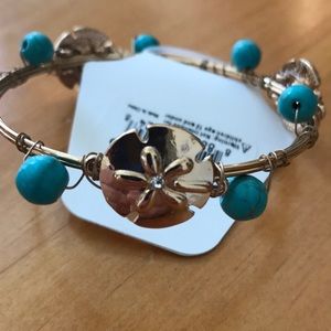 Gold Tone Sand Dollar Turquoise Bangle